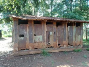 photo of dilapidated latrines at Kariguini primary school in Kandara Constituency.