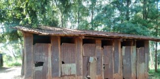 photo of dilapidated latrines at Kariguini primary school in Kandara Constituency.