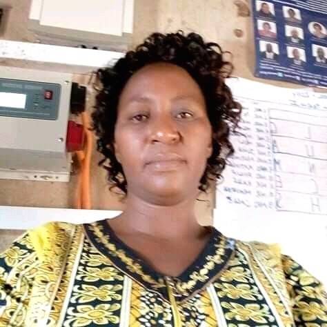 The late Madam Daisy Mbathe Mbaluka, a teacher at Ndooni Primary School, Endau Zone, Mutitu Sub-county, Kitui County. The late madam Daisy was burnt to death by parents.
