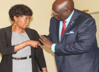 TSC boss Dr. Nancy Macharia (left) shares a note with the Education CS prof. George Magoha.