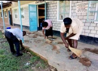 Teachers seen tidying up their school as they resumed to work on Monday morning.