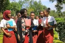 Former Sironga Girls High School Principal, Eve Odhiambo, with her students