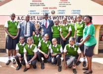 KCSE 2024 candidates pose for a group photo with Education Cabinet Secretary Julius Migosi Ogamba