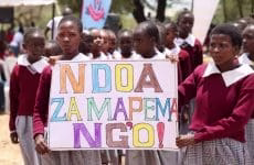 Reprieve for School Girls as FGM cases decline 1 School going girls hold placards with a message against early marriages and Female Genital Mutilation, FGM.