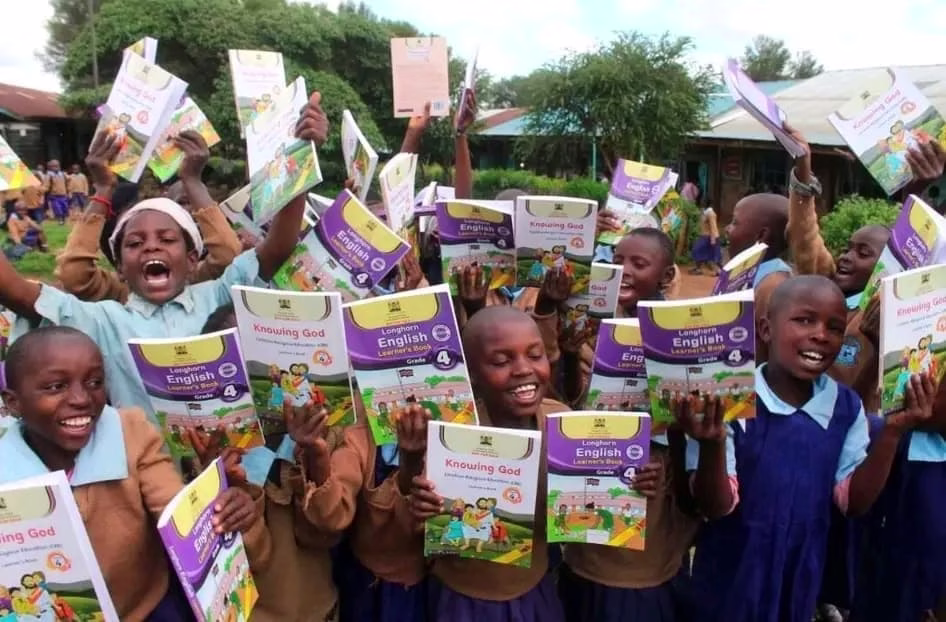 Grade 8 Rationalized Term 2 CBC Schemes of Work 1 Happy moments: Learners express their joy after receiving textbooks under the government's free text book policy program.