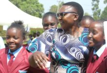 Moi Girls Vokoli High School Chief Principal Hellen Mabese Luhangala hugs a Grade 10 student during admission at the school on January 12, 2026.