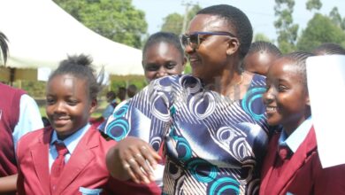 Moi Girls Vokoli High School Chief Principal Hellen Mabese Luhangala hugs a Grade 10 student during admission at the school on January 12, 2026.