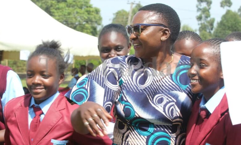 Moi Girls Vokoli High School Chief Principal Hellen Mabese Luhangala hugs a Grade 10 student during admission at the school on January 12, 2026.
